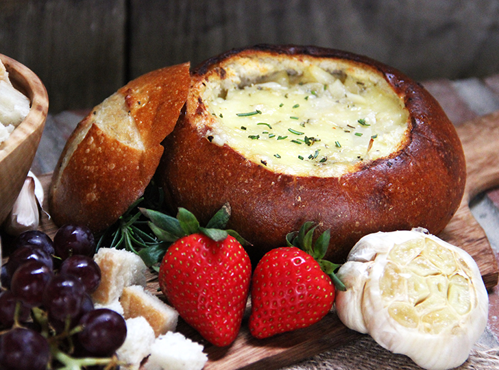 Garlic Butter Baked Brie in a Bread Bowl - The BakerMama